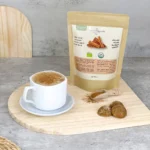 Cup of Ceylon cinnamon tea along with organic Ceylon cinnamon sticks package